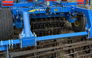 Pivot Track Closer Shown with Optional Center Packer Wheels